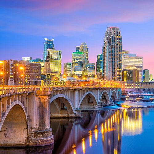 Las Vegas' sparkling purple arches contrast the one in St. Louis