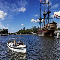 Amsterdam 2-hour Private Canal Cruise with Live Guide and Drinks